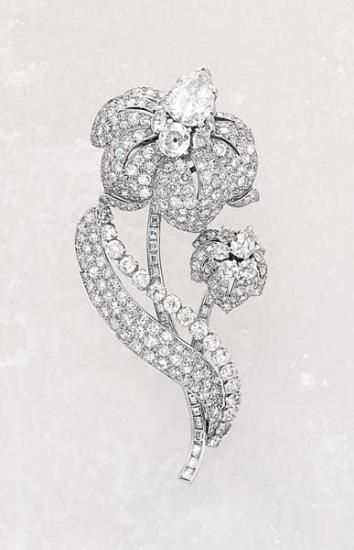 Cartier, A Diamond Brooch, circa 1935 Designed as a pair of peony flowers decora...