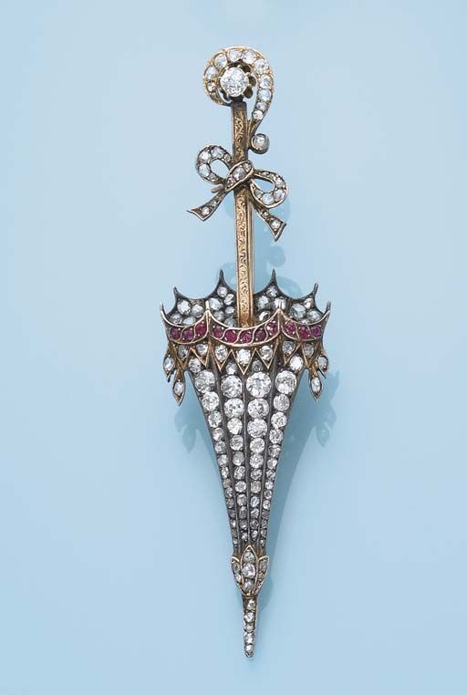 Circa 1870 brooch, designed as a rose-cut diamond umbrella with ruby detail to t...