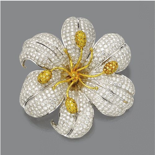 Diamond Flower Brooch. The flower head pavé-set with numerous round diamonds we...