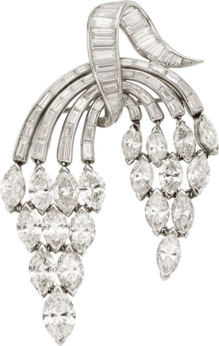 Diamond, Platinum Brooch The articulated brooch features marquise-shaped diamond...