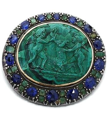 A 19th century malachite, emerald and sapphire cameo brooch Set to the centre wi...