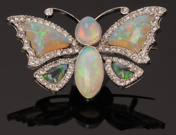 Edwardian-style opal and diamond brooch in the form of a butterfly.