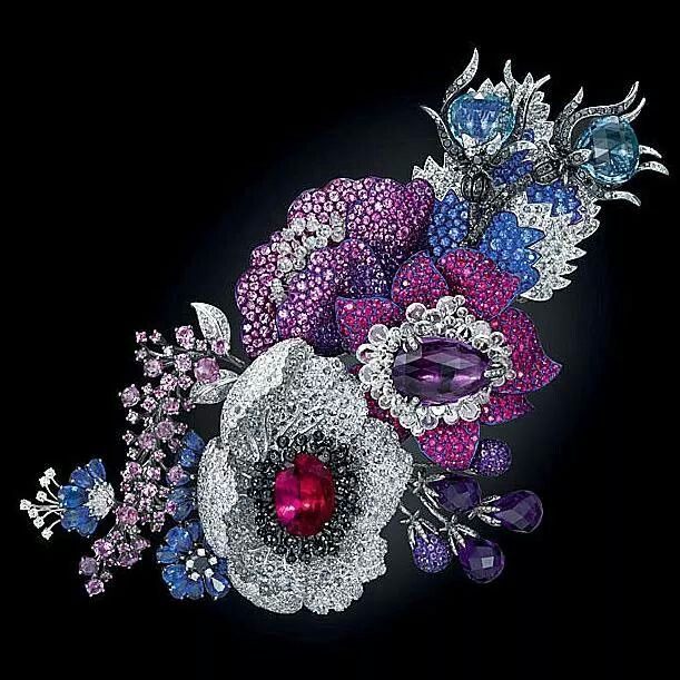 Purple and blue flower brooch by Michelle Ong featuring white and black diamonds...