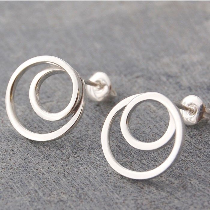 Fashioned from a single square silver wire, these quirky handmade Silver Spiral ...