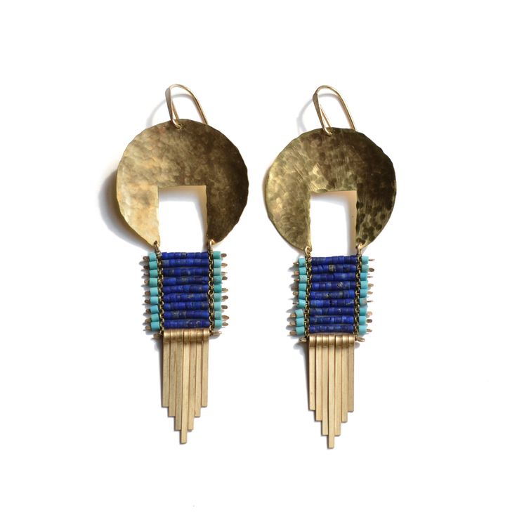 Lapis and tiny turquoise beads capped with hammered brass disc, and finished wit...
