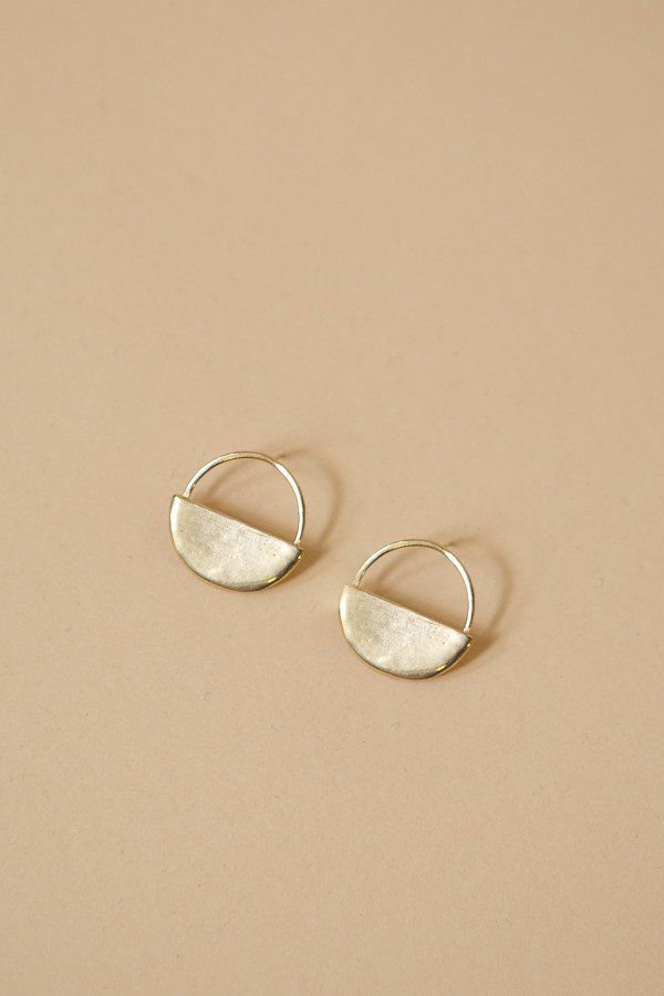 The Sol Post Earrings from Seaworthy feature posts made of brass with half circl...