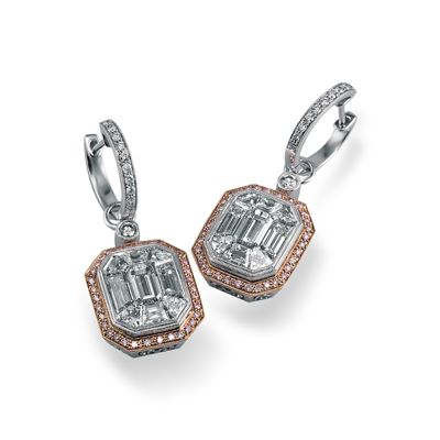 These brilliant 18K white and rose earrings are comprised of a 4.0ctw center mos...