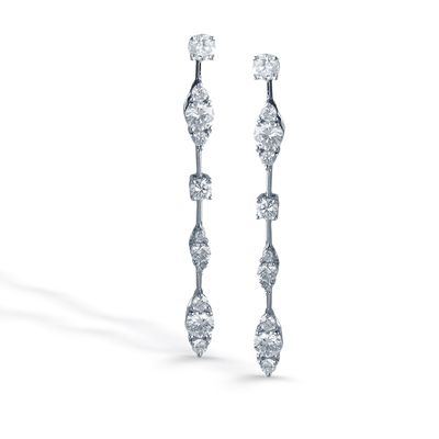 These striking 18K white earrings are comprised of .88ctw round white Diamonds. ...
