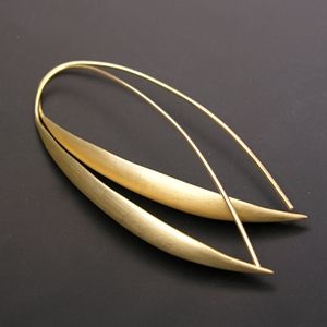 Écu gold earrings by Matin