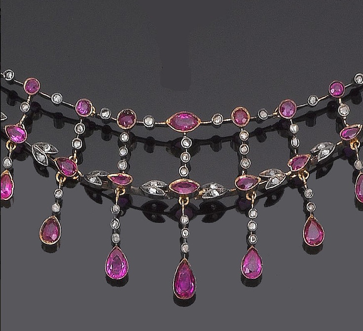 A late 19th century ruby and diamond necklace  Designed as a graduating fringe o...