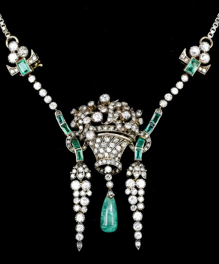 A late Victorian gold and silvery coloured metal, diamond and emerald necklace. ...