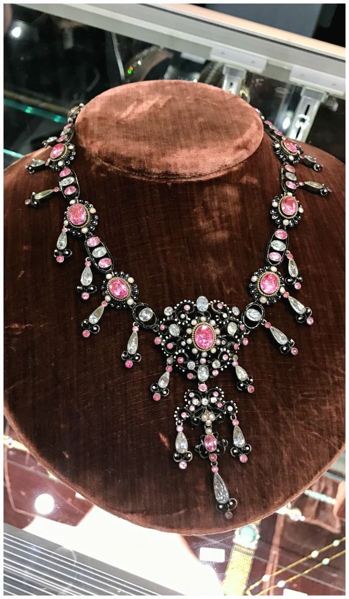 An antique multi-gem necklace with pink quartz and aquamarine from 1890. Seen at...
