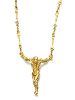 Designed as the figure of Christ, suspended from a series of nail shaped links, ...