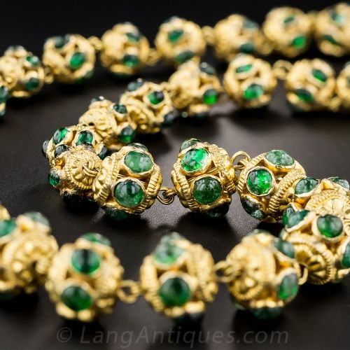 Emerald and gold necklace.