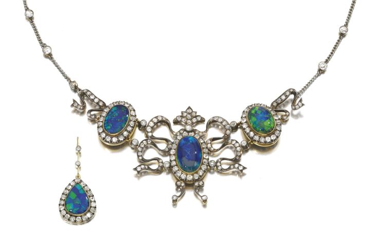 FORMERLY IN THE COLLECTION OF PRINCESS CERIL BIRABONGSE OF SIAM Opal and diamond...