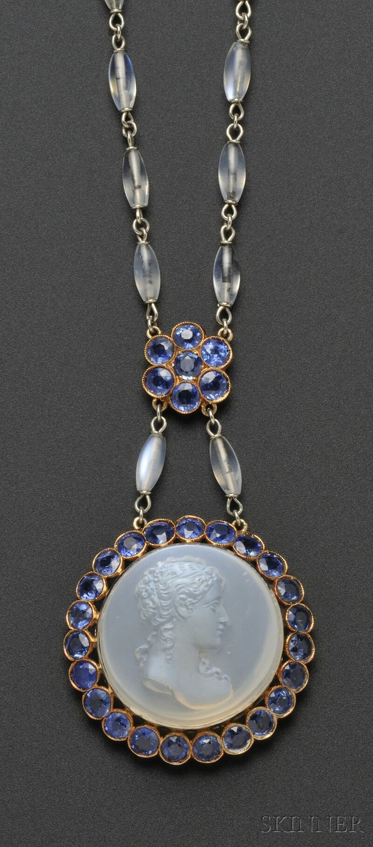 Moonstone cameo, moonstone, sapphire and gold necklace, circa 1920.