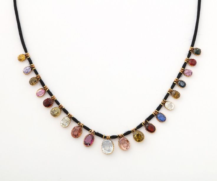 Victorian multicolored gemstone drop necklace set in gold and later strung on a ...