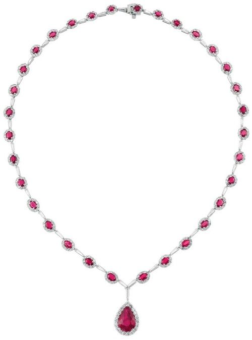 White Gold, Ruby and Diamond Pendant-Necklace  Composed of 32 oval rubies approx...