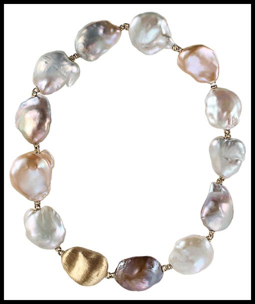 Yvel Souffle Baroque Pearl Necklace. Via Diamonds in the Library.