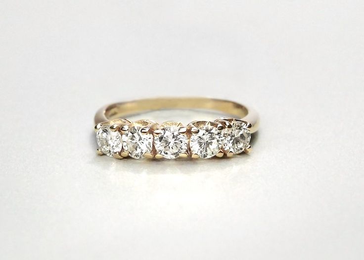 How gorgeous is this refurbished five stone ring?