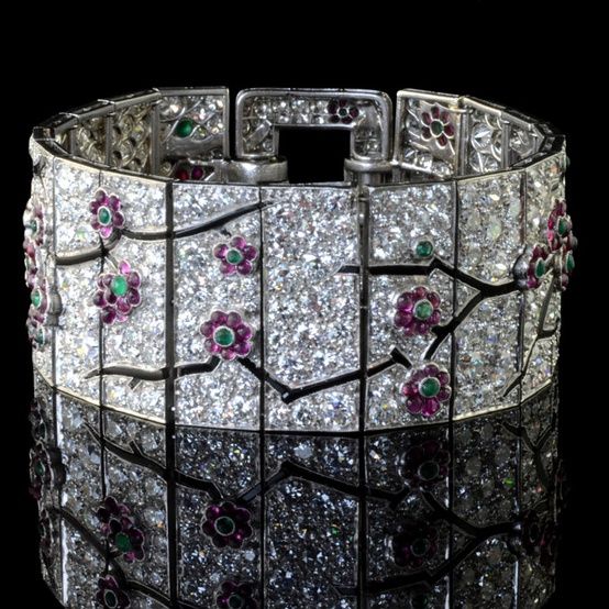 Art Deco Cartier cherry blossom bracelet. Circa 1925.  Via Diamonds in the Libra...