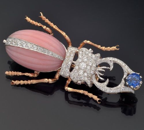 Brooch of gold with pink opal, sapphire and diamonds
