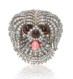 CONCH PEARL AND DIAMOND BROOCH The old-cut diamond set brooch designed as a pupp...