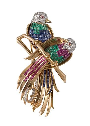 Paradise birds brooch in yellow gold and platinum set with invisibly set rubies,...