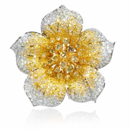 This lovely 18k white and yellow gold flower brooch pin, contains 163 round bril...