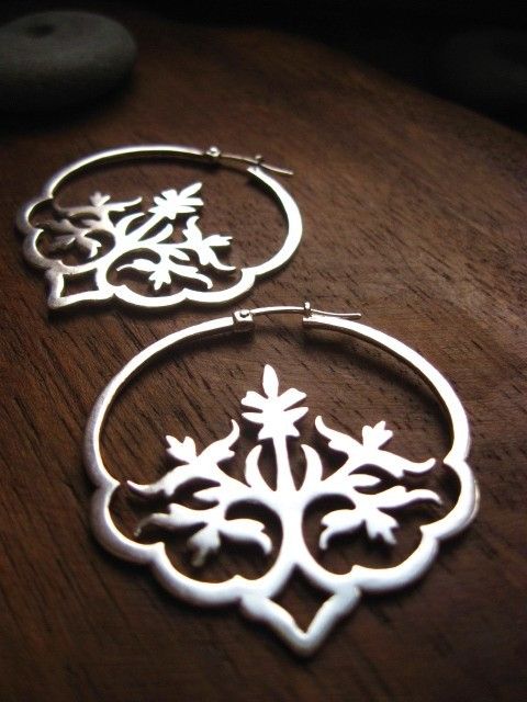 These lovely Indian-inspired floral earrings were handmade from sterling silver.