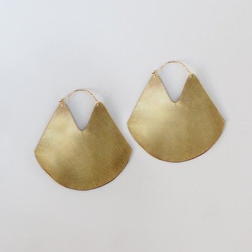 gold earrings.