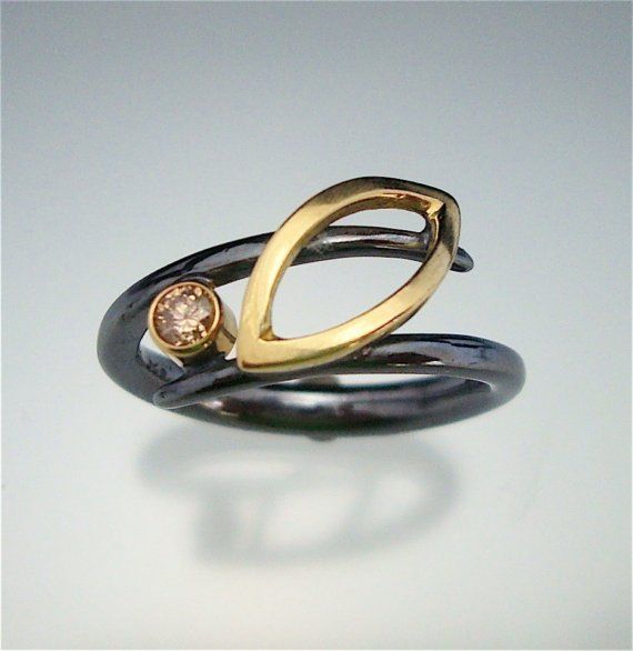 Danielle Miller/ reminds me of my wedding ring design a bit :)