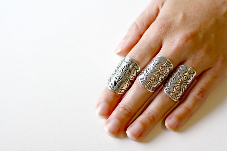 chunky silver rings with mandala symbols www.thefiftheleme...