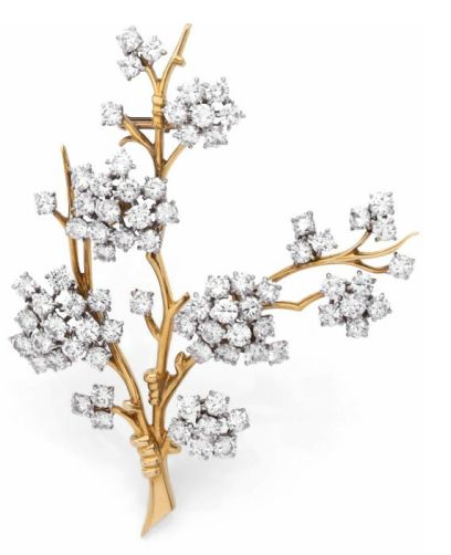 A DIAMOND, YELLOW GOLD AND PLATINUM BROOCH BY Van Cleef  Arpels. CIRCA 1960