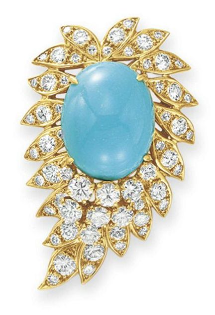 A TURQUOISE AND DIAMOND BROOCH, BY VAN CLEEF & ARPELS  Set with an oval cabochon...