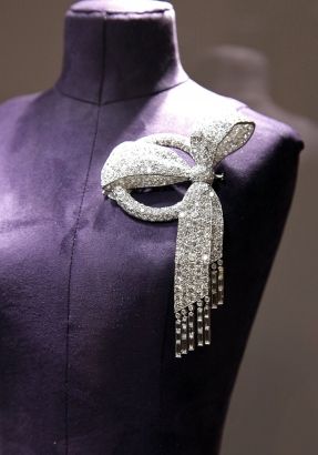 A Van Cleef & Arpels art deco diamond bow brooch is on display during a press pr...
