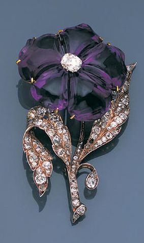 A late 19th century amethyst and diamond pansy brooch, circa 1880 The single blo...