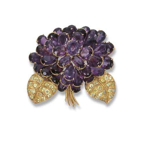 AN AMETHYST AND PERIDOT FLORAL BROOCH, BY RENE BOIVIN