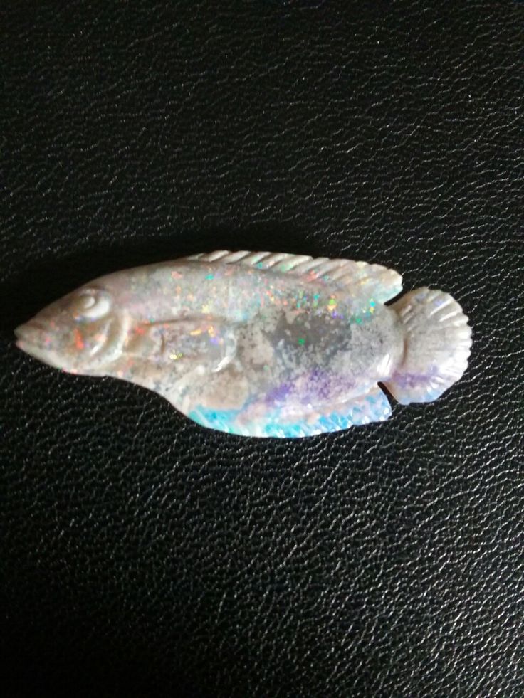 Betta fish carved from opal.