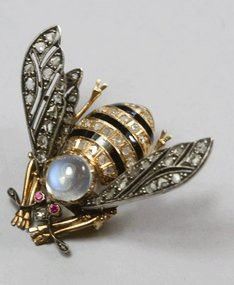 It is not a ring, but it is a bee and a moonstone and is beautiful.
