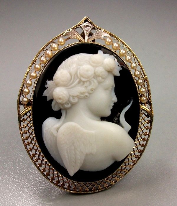 Museum Quality hard stone cameo depicting Cupid, the God of Love. This cameo is ...