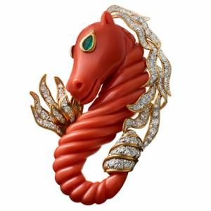 Seahorse brooch of coral, diamonds, emeralds, platinum and gold, by David Webb, ...