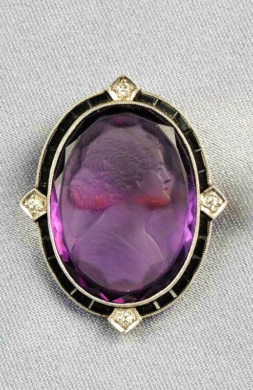 Art Deco Amethyst Cameo Brooch depicting a lady in profile, framed by onyx and o...