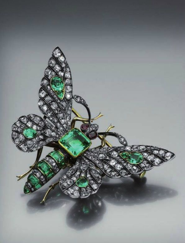 Boucheron - An antique gold, silver, diamond and emerald butterfly brooch, circa...
