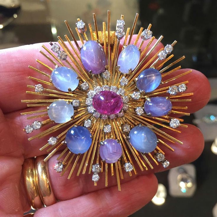 @joannahardyltd. This Brooch- Star sapphires and a cabochon Ruby. 50's style...