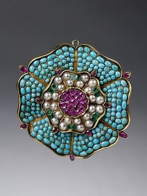 A Turquoise Ruby Emerald and Pearl Brooch in the form of a Tudor Rose1830-1840