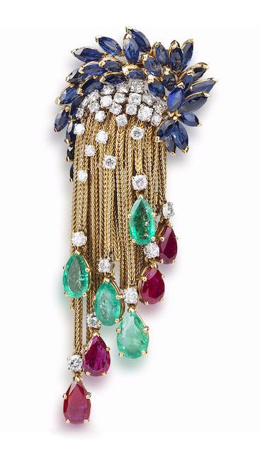 A diamond, emerald, ruby and sapphire brooch, by Marchak, circa 1965. Via Bonham...