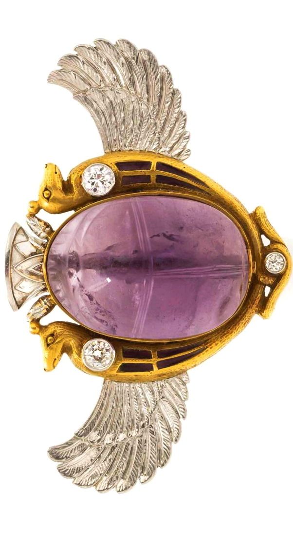An Egyptian Revival Platinum, Gold, Enamel, Amethyst and Diamond Winged Scarab B...