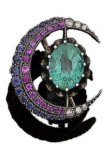 An emerald, sapphire, ruby, and diamond crescent brooch, circa 1900. The oval-cu...