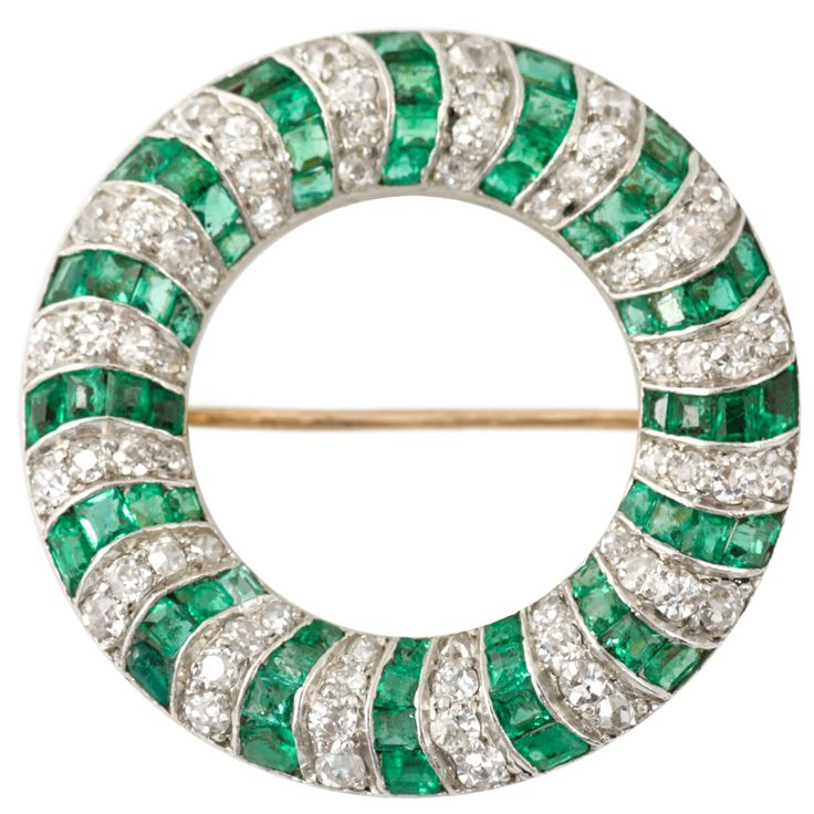 French 1920s emerald and diamond open circle brooch